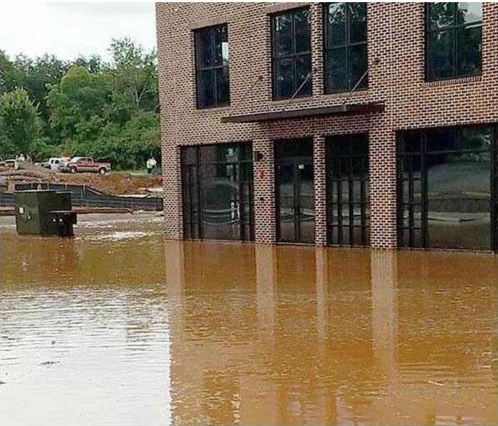 Flood waters surrounding a building